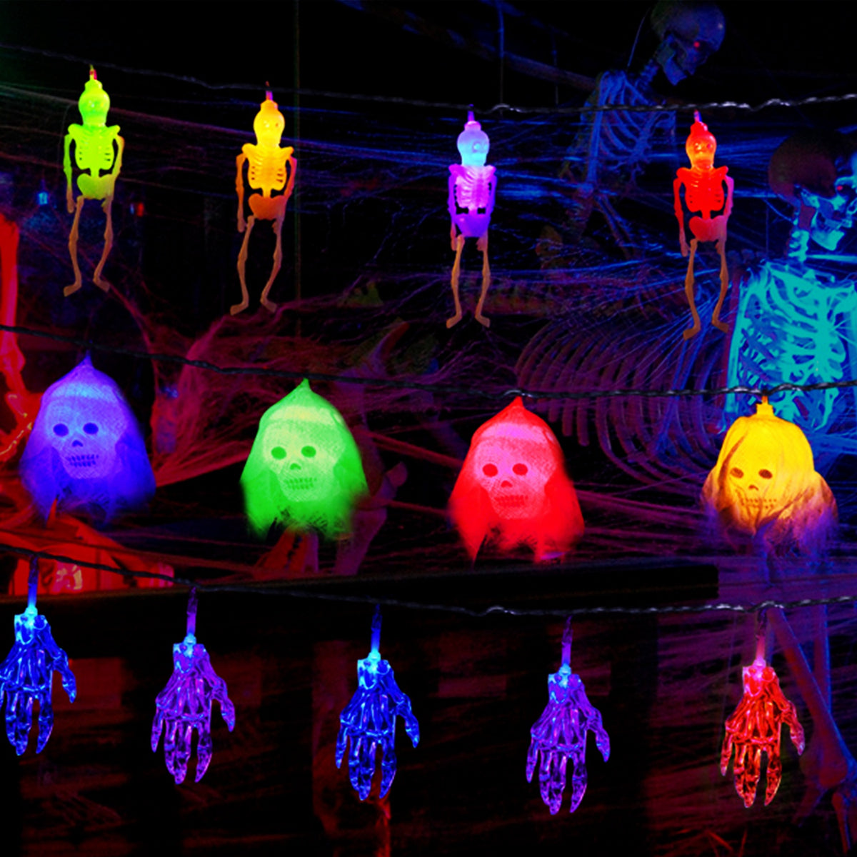 Halloween Skeleton, Skull & Hand String Lights – all three strings lit in four colors