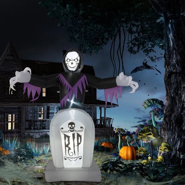 6 ft Inflatable Grim Reaper & Tombstone – lit up in a yard at night