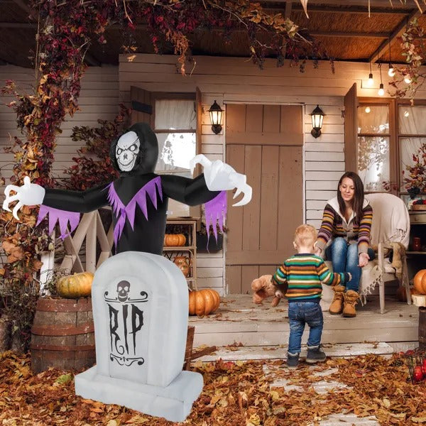 6 ft Inflatable Grim Reaper & Tombstone – on a porch in daylight