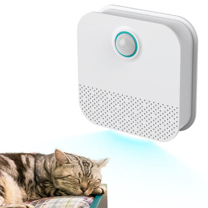 Rechargeable Litter Box Odor Eliminator above a sleeping cat